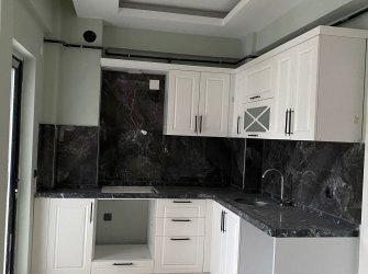 SAMSUN ATAKUM KURUPELİT MH 1+1 5.KAT 55m2 YERDEN ISITMALI ÖZEL YAPIM GENİŞ BALKONLU SIFIR FIRSAT DAİRE