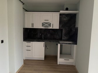 SAMSUN ATAKUM KURUPELİT MH 1+1 5.KAT 55m2 YERDEN ISITMALI ÖZEL YAPIM GENİŞ BALKONLU SIFIR FIRSAT DAİRE 