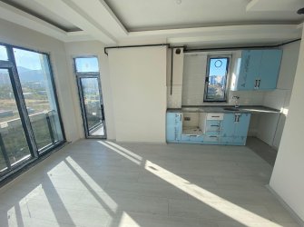 SAMSUN ATAKUM KURUPELİT MAH 2.KAT 1+1 YERDEN ISITMALI DENİZ VE DOĞA MANZARALI 55m2 SIFIR DAİRE 