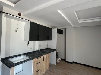 SAMSUN ATAKUM KURUPELİT MH 2+0 YÜKSEK GİRİŞ 80m2 BALKONLU OTOPARKLI KREDİYE UYGUN SIFIR FIRSAT DAİRE 